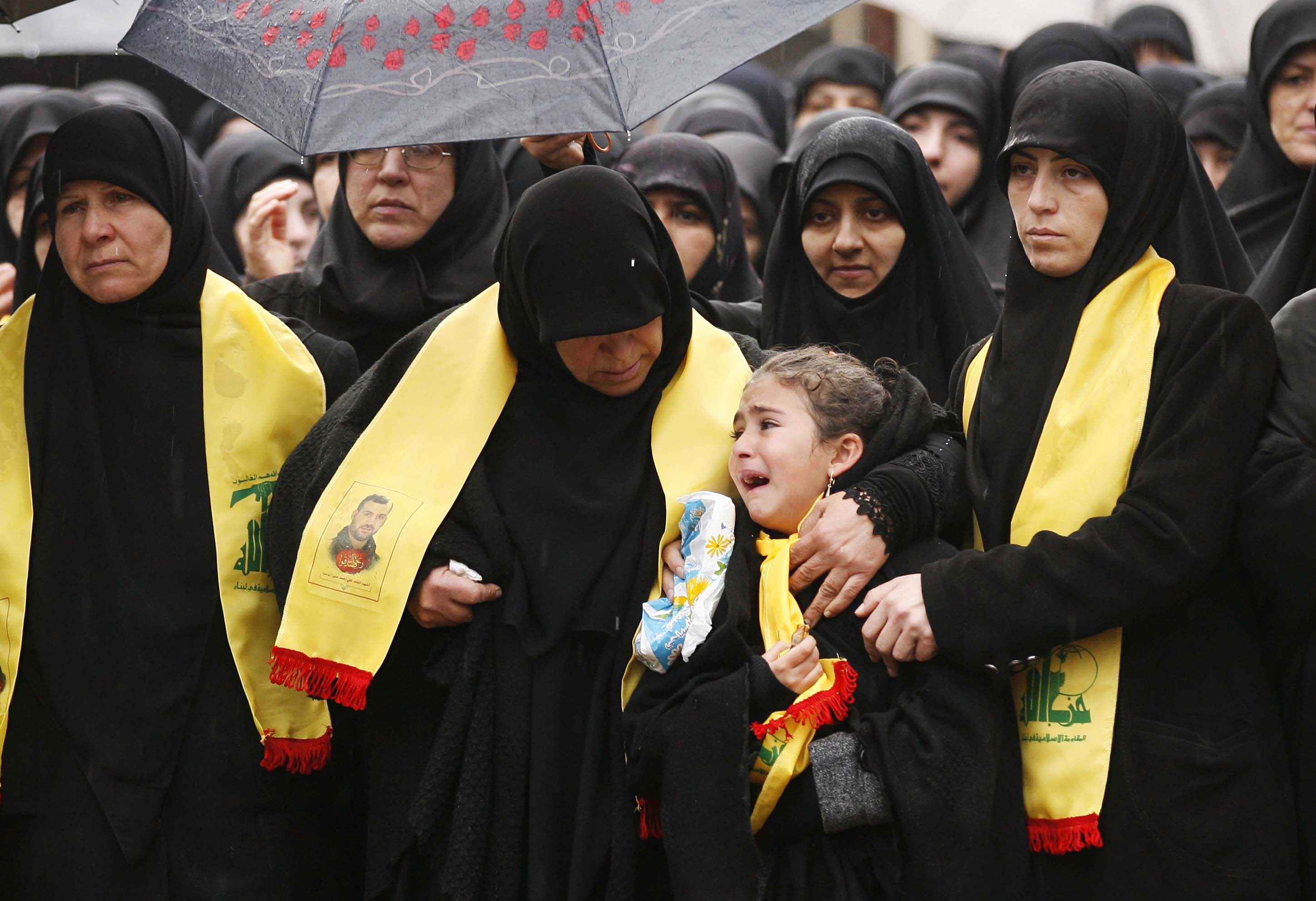 Mourners attend the funeral of Ali Ahmed Sabra