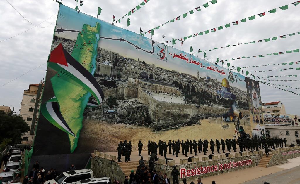 אנשי הזרוע הצבאית של חמאס בעת חגיגות לציון 31 שנים להקמת התנועה. עזה, 16 בדצמבר 2018.
