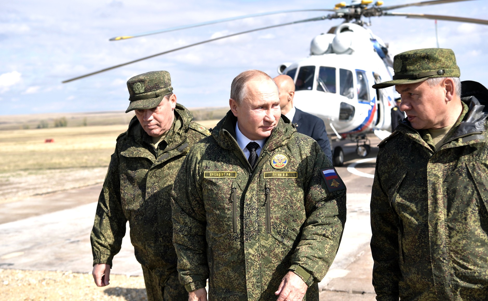 Putin, Defense Minister Sergei Shoigu and Chief of Staff Valery Gerasimov |