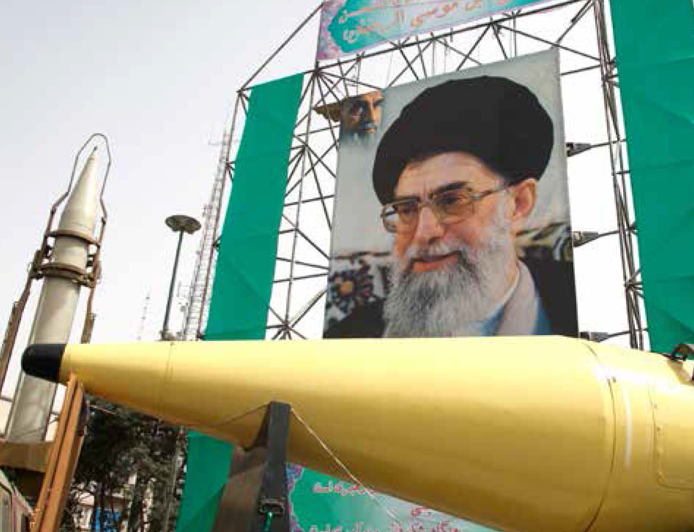 Iranian Shahab-2 (L) and Shahab-3 missiles on display in front of a large portrait of Supreme Leader Ayatollah Ali Khamenei. Photo: AFP/Getty Images