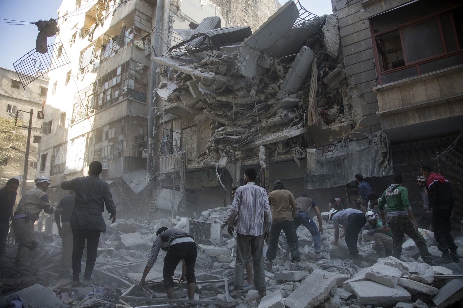Rebel-held neighborhood in Aleppo following air strikes by government forces, Septem- ber 27, 2016. Photo: Karam al-Masri / AFP