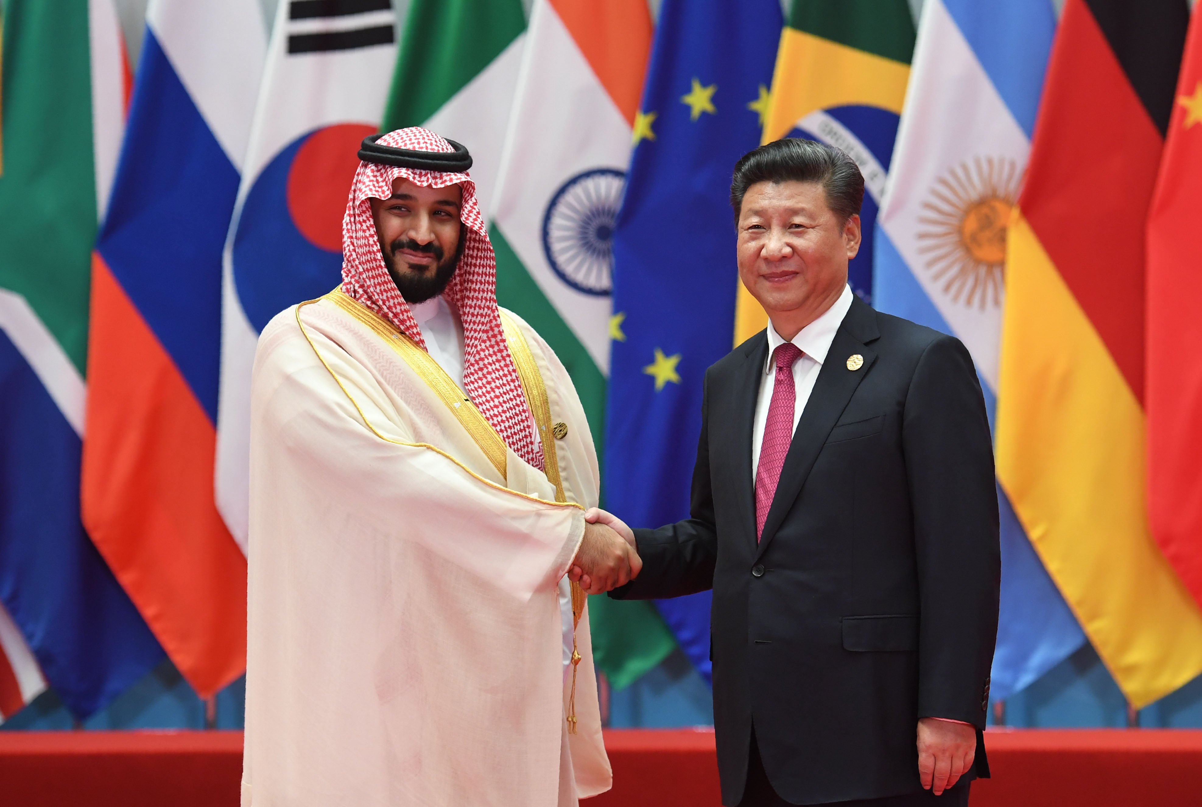 Saudi Arabia's Deputy Crown Prince and Minister of Defense Muhammad bin Salman al-Saud (l) with China's President Xi Jinping at the G20 summit in Hangzhou, September 4, 2016. Photo: Greg Baker / AFP
