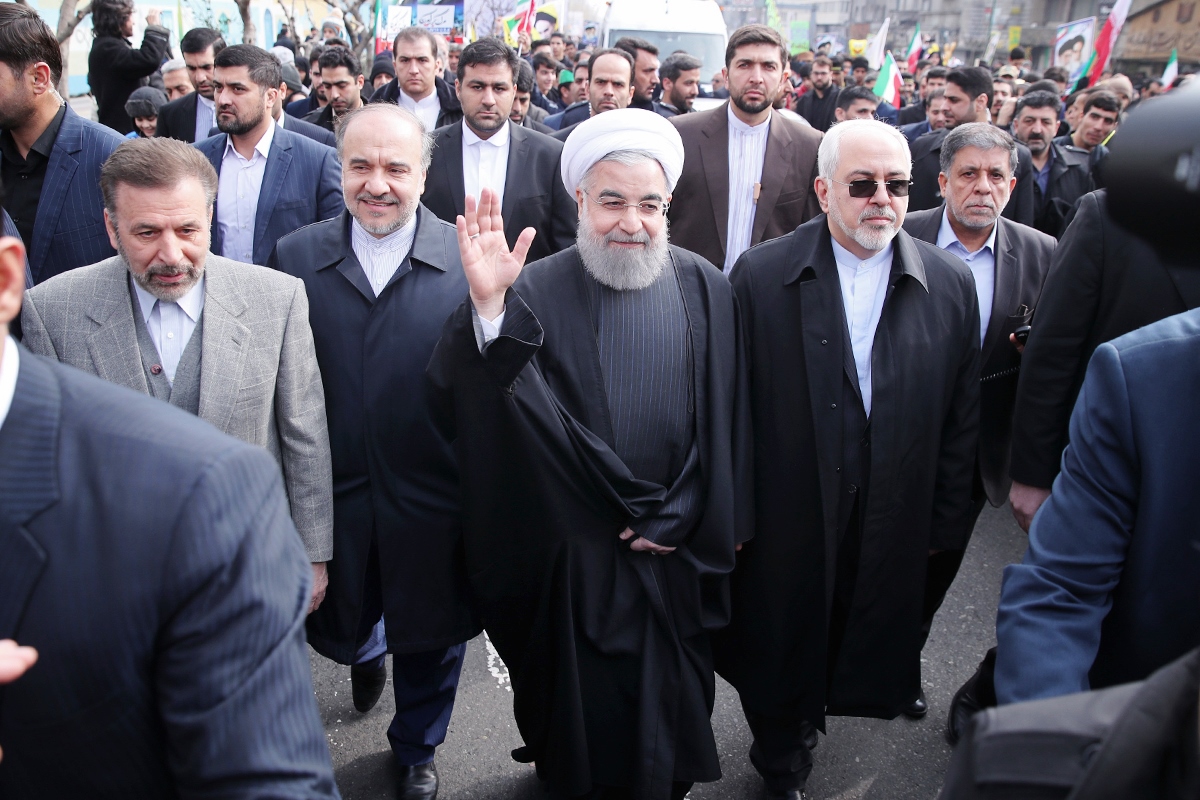 Iranian President Hassan Rouhani (c) and Foreign Minister Mohammad Javad Zarif (c-r) at a ceremony to mark the 38th anniversary of the Islamic Revolution, Tehran, February 10, 2017. Photo: HO / Iranian Presidency / AFP