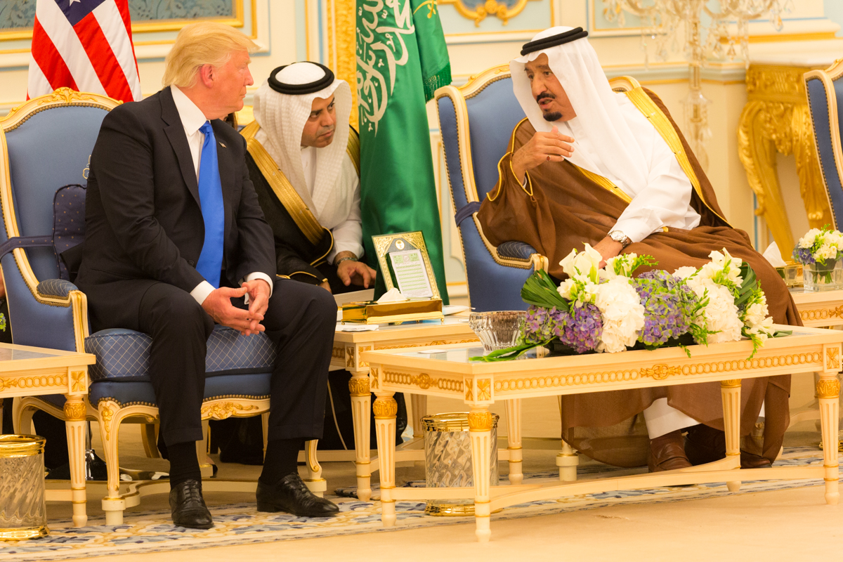 President Donald Trump and King Salman bin Abdulaziz Al Saud of Saudi Arabia talk together during ceremonies, Saturday, May 20, 2017, at the Royal Court Palace in Riyadh, Saudi Arabia