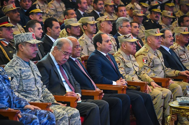 Egyptian President Abdel Fattah al-Sisi (4th L), Prime Minister of Egypt Sherif Ismail Mohamed (2nd L), Egyptian Minister of Defence Sedki Sobhy (5th L) and other military and civilian officials attend a symposium titled 'Counter Terrorism' and 'National Will' and organized by Egyptian Armed Forces in Cairo, Egypt on February 9, 2017.