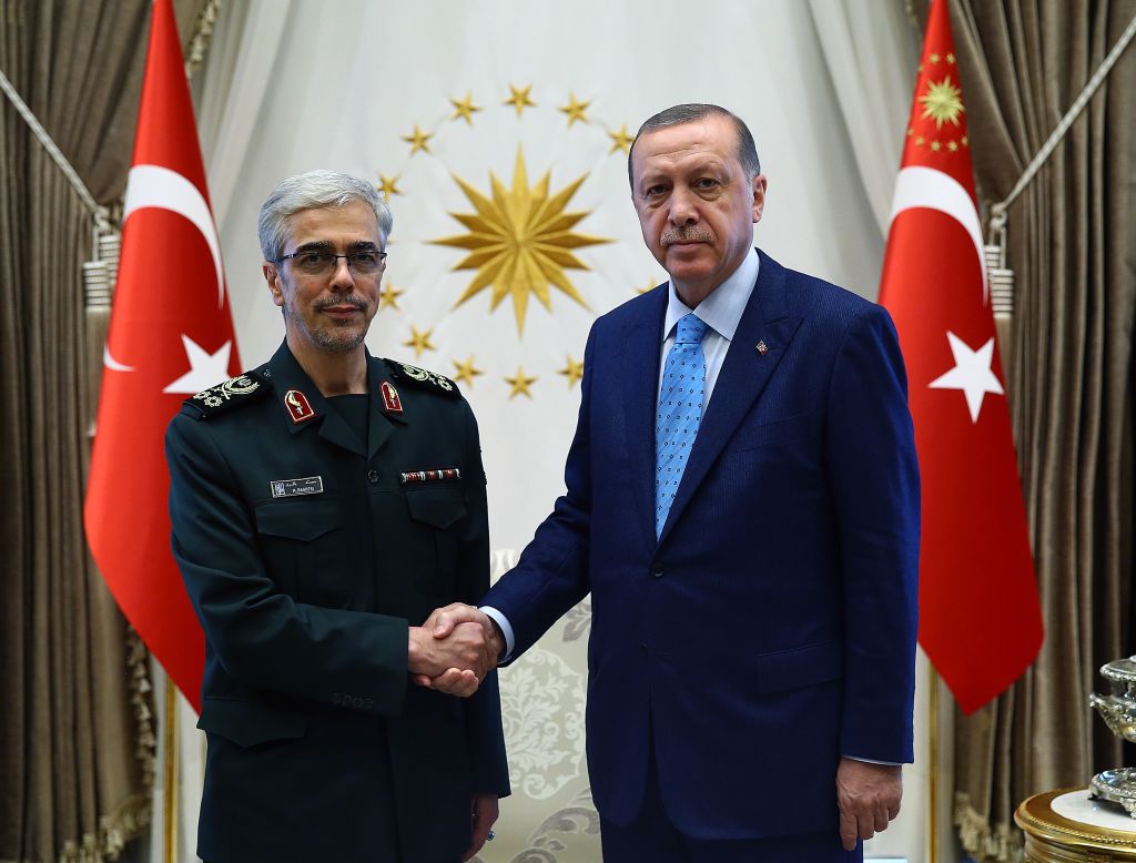 President of Turkey Recep Tayyip Erdogan (R) shakes hands with General Staff of the Armed Forces of Iran, Mohammad Bagheri (L) ahead of their meeting at Presidential Complex in Ankara, Turkey on August 16, 2017.