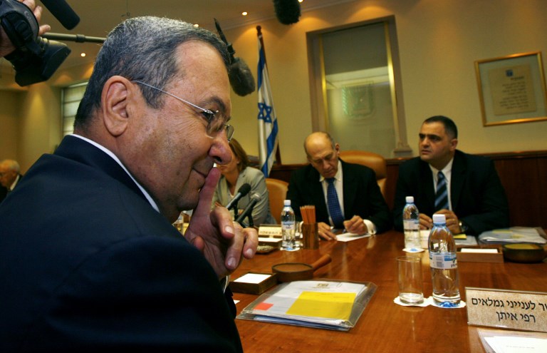 Israeli Defence Minister Ehud Barak (L) gestures during the weekly cabinet meeting in Jerusalem, 9 September 2007, three days after Syria said Israeli warplanes violated its airspace.