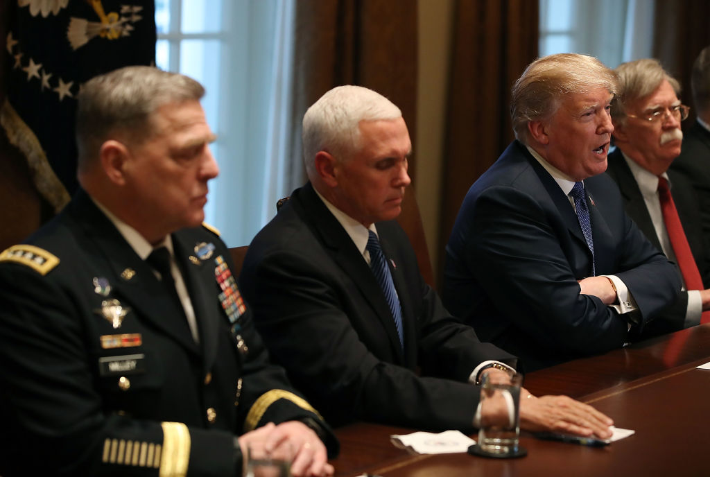 U.S. President Donald Trump speaks during a briefing from senior military leaders regarding Syria, in the Cabinet Room, on April 9, 2018 in Washington, DC. Also pictured is Chief of Staff of the U.S. Army Mark Milley (L), Vice President Mike Pence, (2nd-L), and National Security Advisor John Bolton (R).