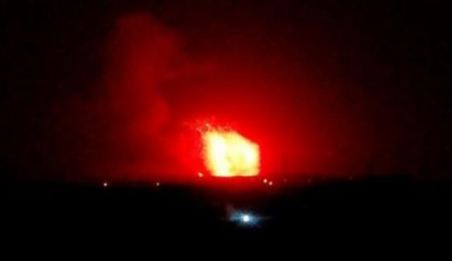 Fire and explosions seen in the countryside south of Hama city, Syria, April 29, 2018.