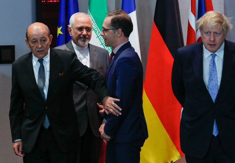 Iran's Foreign Minister Mohammad Javad Zarif (2nd R), France's Foreign Minister Jean-Yves Le Drian (2nd L), Germany Foreign Minister Heiko Maas (R), EU High Representative for Foreign Affairs and Britain's Foreign Secretary Boris Johnson (R) arrive for a meeting of EU/E3 with Iran at the EU headquarters in Brussels on May 15, 2018.