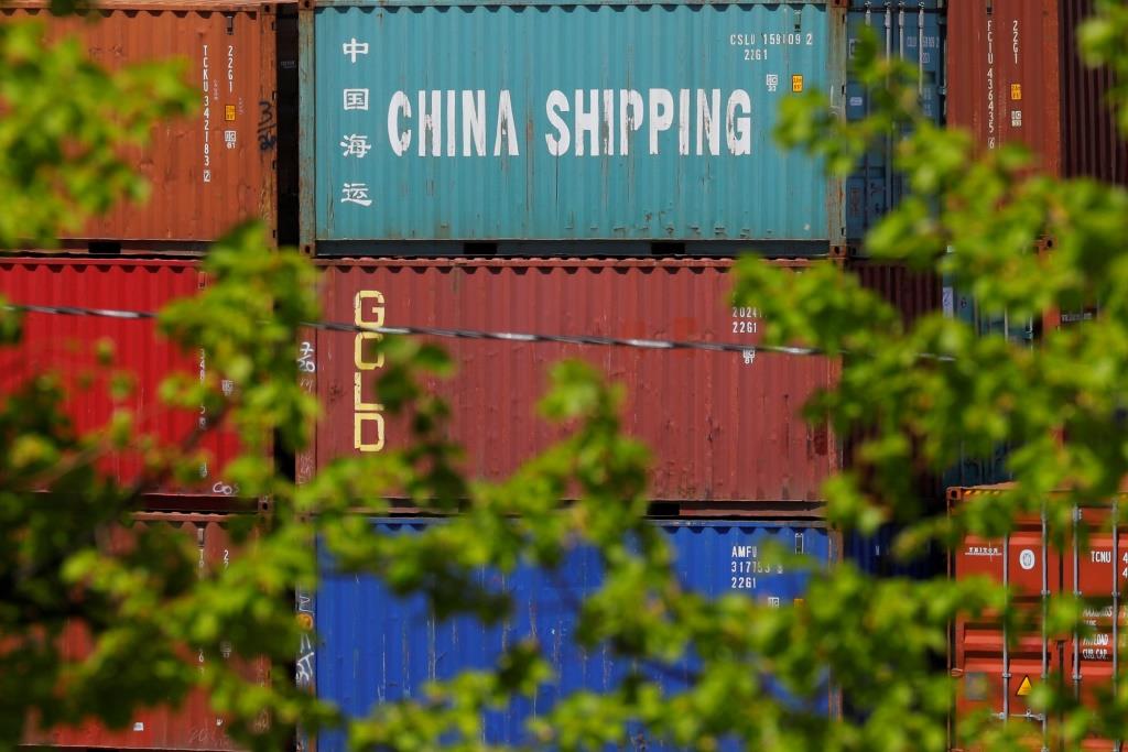 Shipping containers, including one labelled