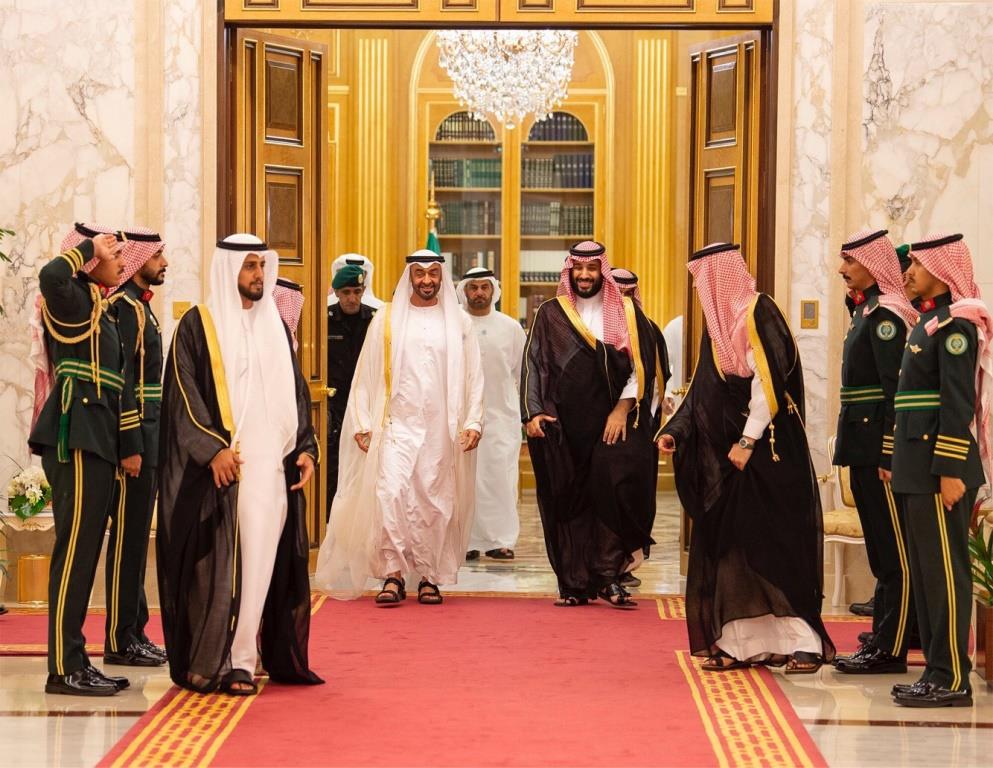 Abu Dhabi's Crown Prince Sheikh Mohammed bin Zayed al-Nahyan walks with Saudi Crown Prince Mohammed bin Salman during the Saudi-UAE Summit in Jeddah, Saudi Arabia, June 6, 2018.