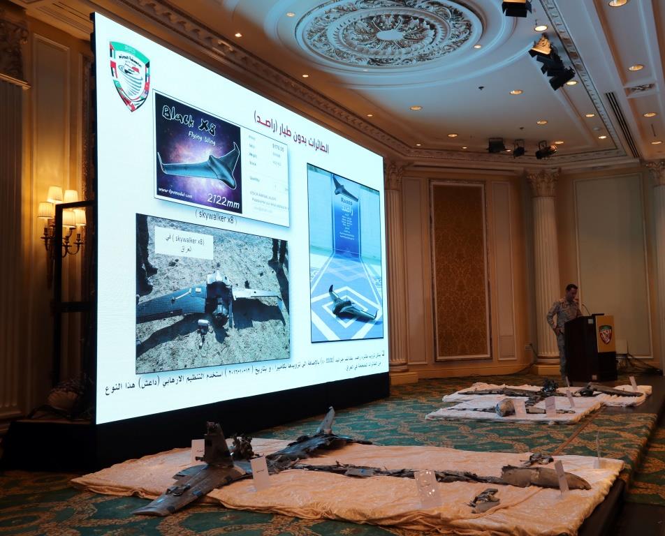 Saudi-led coalition spokesman, Colonel Turki al-Malki, displays Iran-aligned Houthi drones, brought down April 11, over Jizan and Abha, during a news conference in Khobar, Saudi Arabia April 16, 2018.