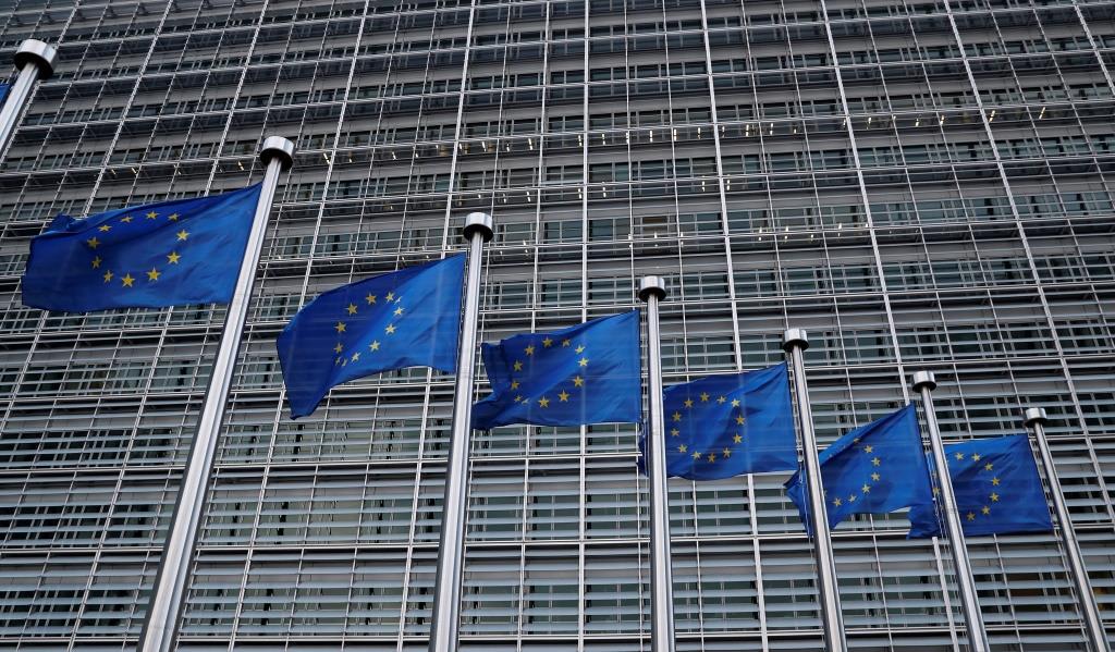 European Union flags flutter outside the EU Commission headquarters in Brussels, Belgium, March 8, 2018.