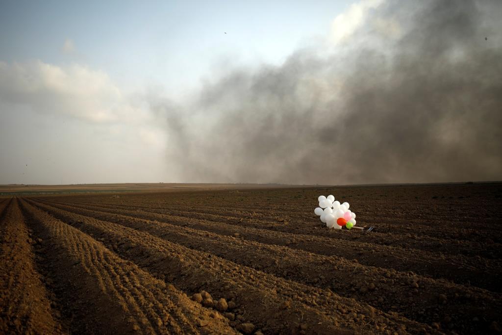 Incendiary balloons in a field near the border fence between Israel and the Gaza Strip. October 19, 2018.