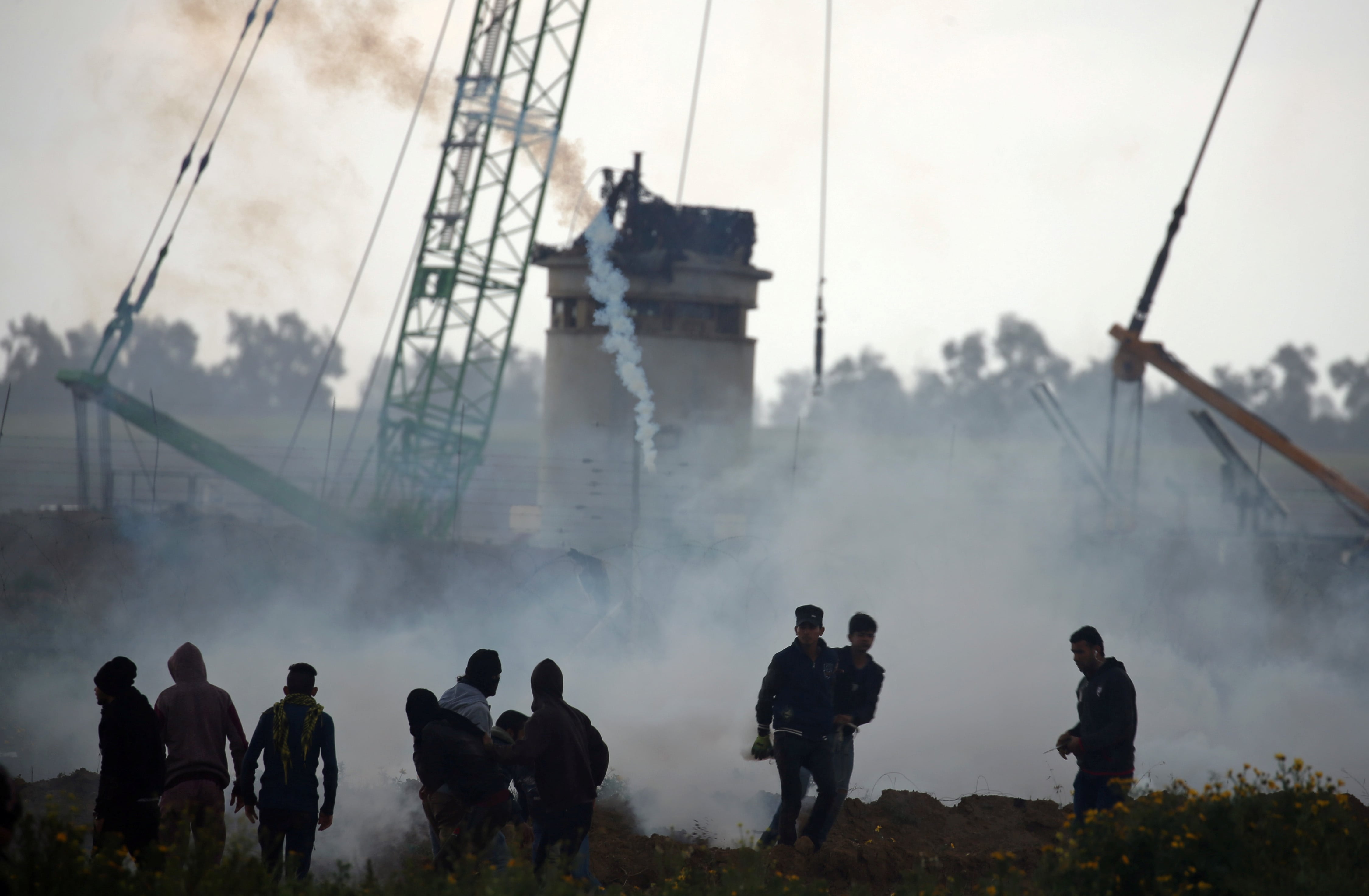 Tear gas is fired by Israeli forces as Palestinian demonstrators protest at the Israel-Gaza border fence, in the southern Gaza Strip March 1, 2019.