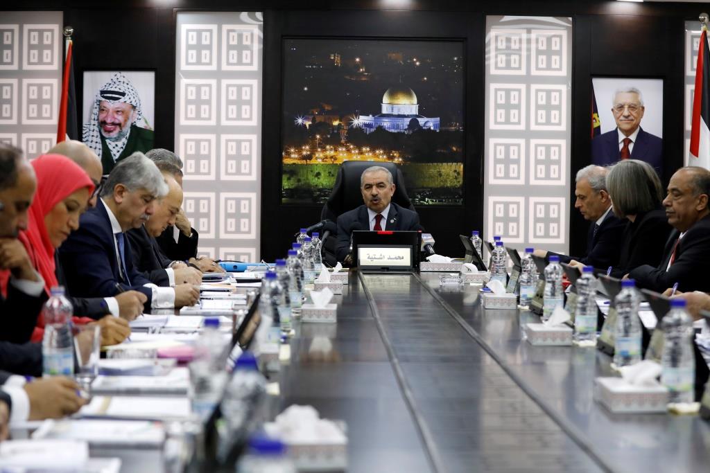 Palestinian Prime Minister Mohammad Shtayyeh speaks during a cabinet meeting of the new Palestinian government, in Ramallah, the West Bank, April 15, 2019.