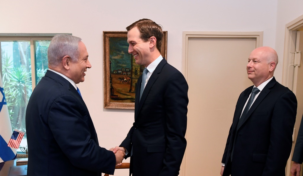 Israeli Prime Minister Benjamin Netanyahu greets Senior White House advisor Jared Kushner and Middle East envoy Jason Greenblatt, during their meeting in Jerusalem May 30, 2019.