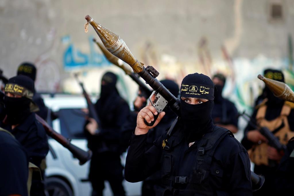 Palestinian Islamic Jihad militants take part in an anti-Israel military show at Al-Shati refugee camp in Gaza City, June 20, 2019.