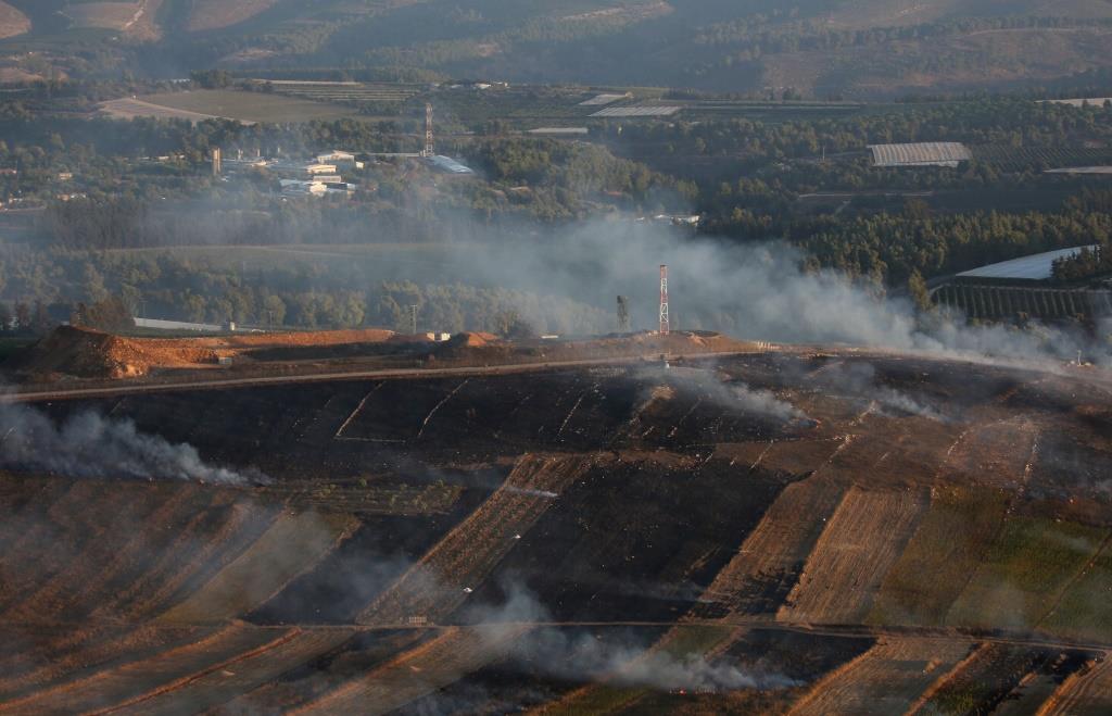 Smoke rises from shells fired from Israel in Maroun Al-Ras village, near the border with Israel, in southern Lebanon, September 1, 2019.