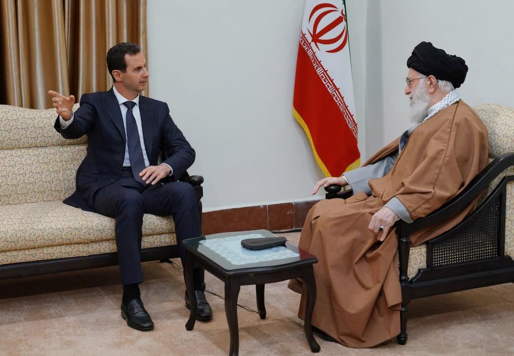 Syria's President Bashar al-Assad meets with Iranian Supreme Leader Ayatollah Ali Khamenei in Tehran, February 25, 2019.