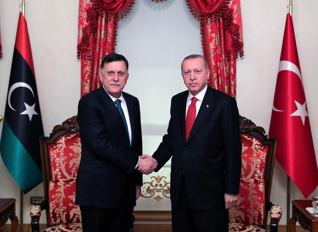 Turkish President Tayyip Erdogan meets with Libya's internationally recognised Prime Minister Fayez al-Sarraj in Istanbul, Turkey, November 27, 2019.