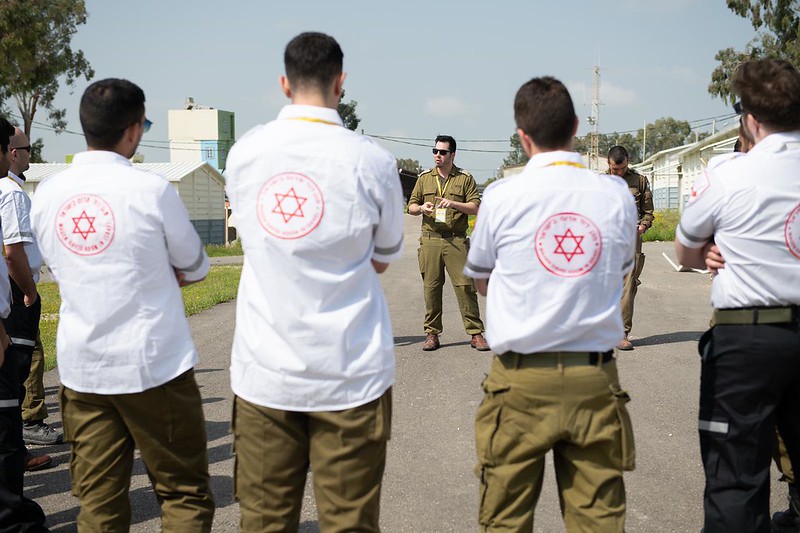 Soldiers helping Magen David Adom