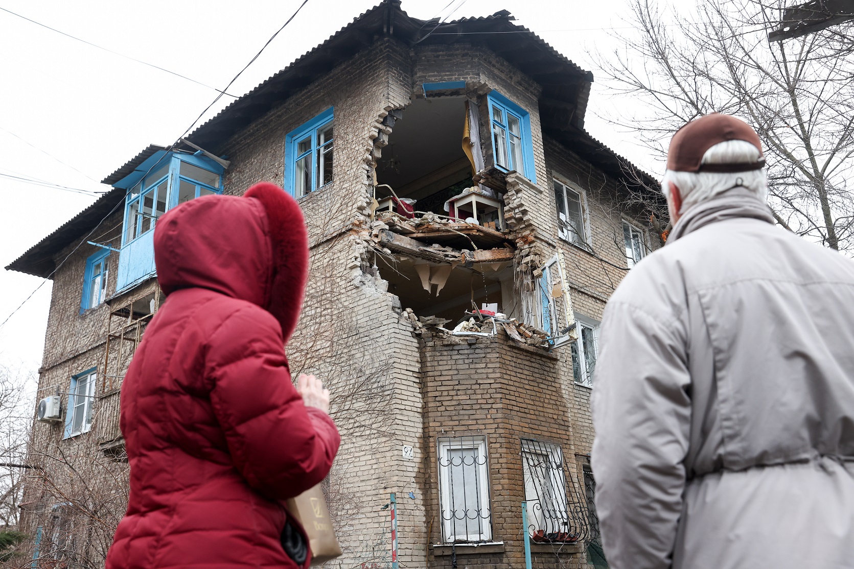 The war in Ukraine highlights the underlying competing values in the international arena. Ukrainian citizens eye their home, damaged in a Russian attack