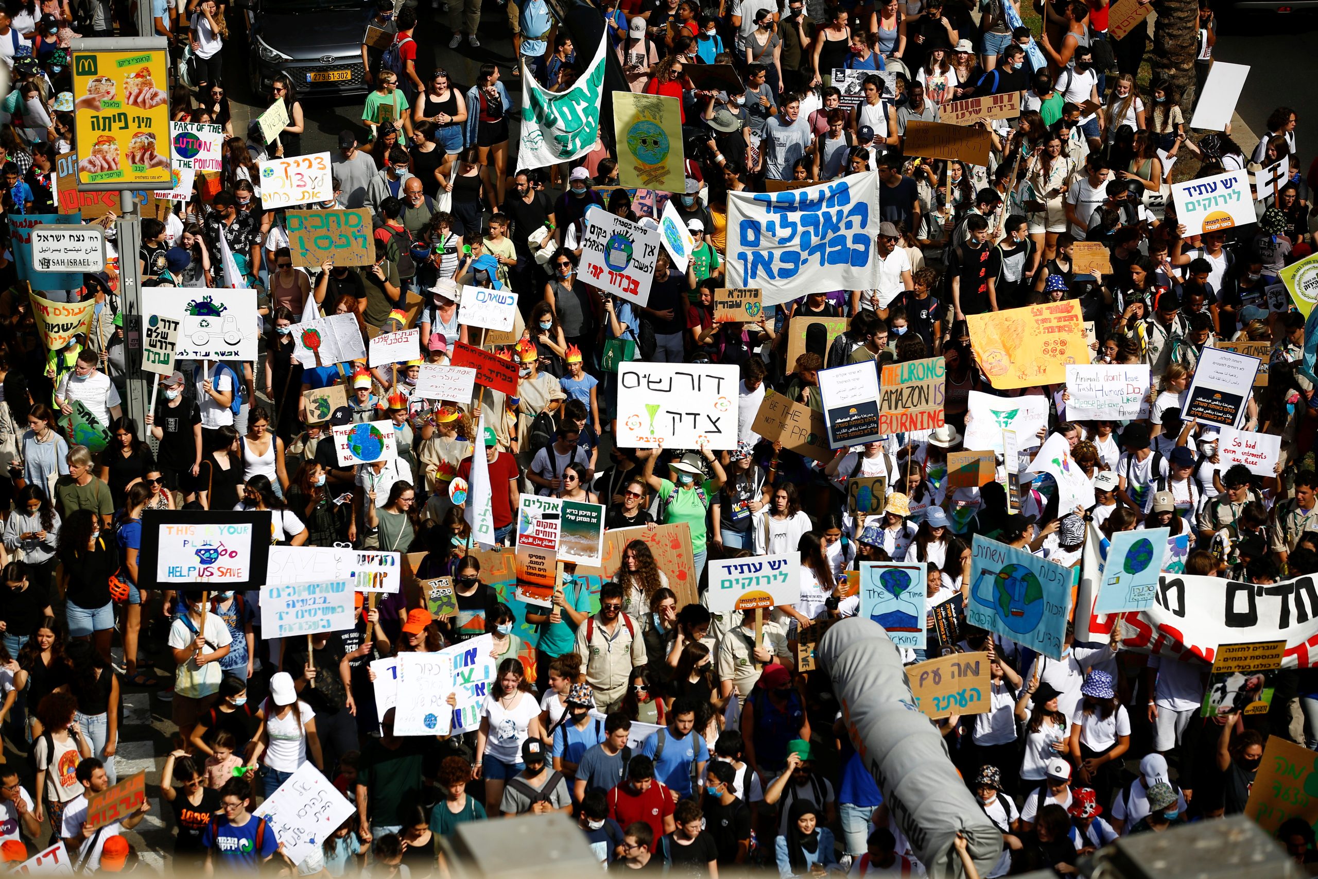 The State of Israel should implement existing government decisions quickly, and pass a meaningful climate law. Demonstration on climate crisis, Tel Aviv