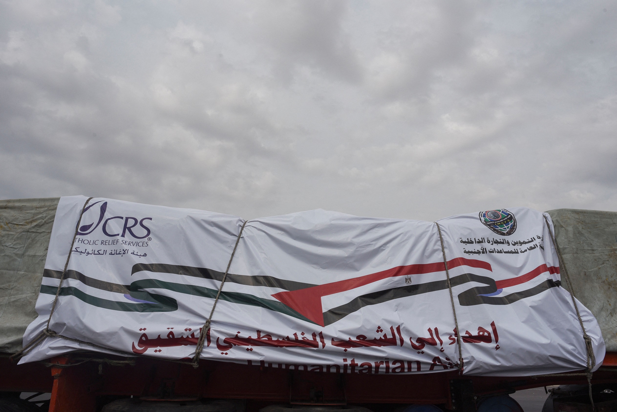 Trucks carrying humanitarian aid to Palestinians on their way to the Rafah border crossing to enter Gaza |